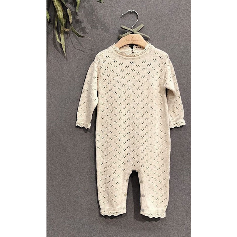 Gebreide babysuit